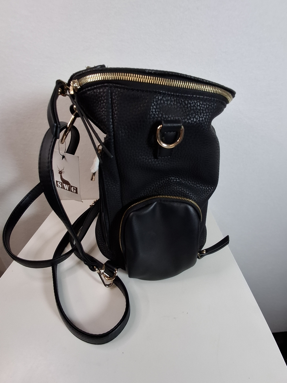 SWG Black Pebbled Sling Barrel Backpack with Gold Accents - Picture 7 of 11
